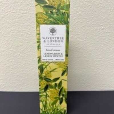 Tall rectangular box with a leafy yellow-green botanical print