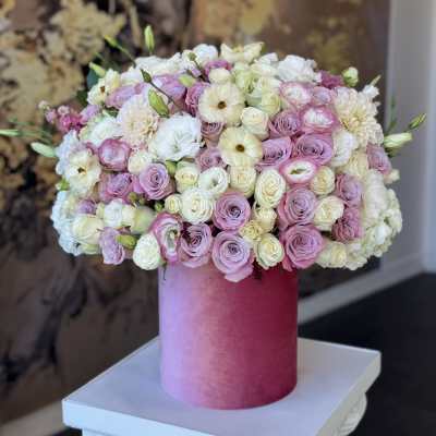 Pink and white rose bouquet in a tall pink box