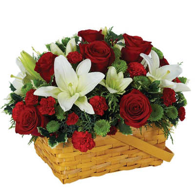 Red roses and white lilies arranged in a wicker basket