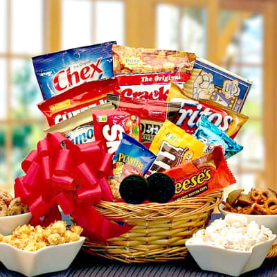Gift basket filled with snack bags and a red bow