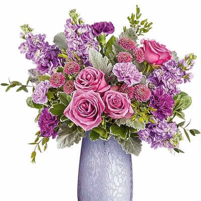 Pink and purple bouquet in a lavender vase