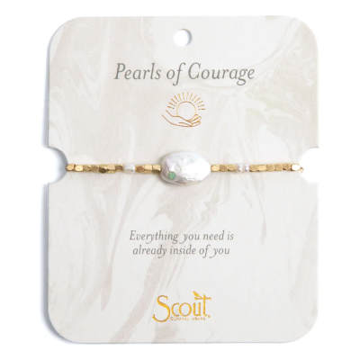 Gold beaded bracelet with a large white pearl on a decorative card labeled Pearls of Courage.