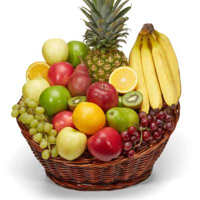 Fruit basket with pineapple, bananas, apples, grapes, oranges, pears, and kiwi