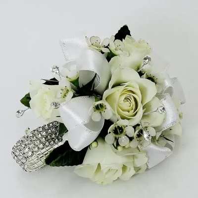White rose wrist corsage with silver ribbon and rhinestone bracelet