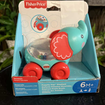 Fisher-Price elephant toy in retail packaging