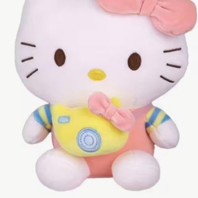 Hello Kitty plush toy with a pink bow and pastel outfit