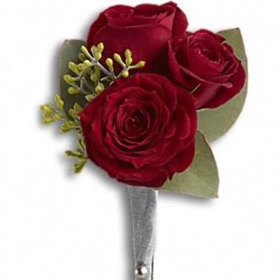 Red rose boutonniere with silver-wrapped stem and pearl pins