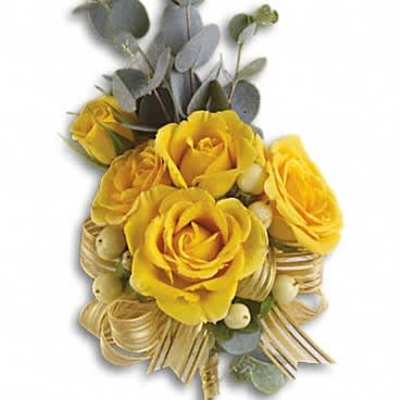 Yellow rose corsage with white berries, gold ribbon, and tall eucalyptus accents