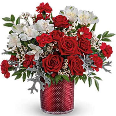 Red roses and white alstroemeria in a red vase