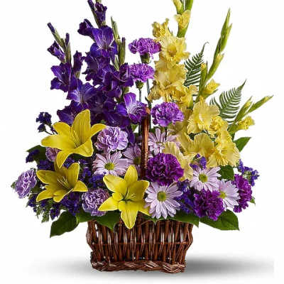 Purple and yellow floral arrangement in a wicker basket