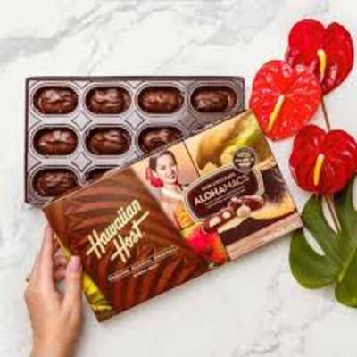 Chocolate gift boxes with red anthurium flowers
