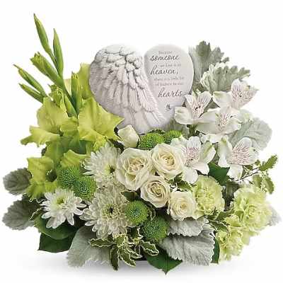 White and green sympathy arrangement with a memorial stone