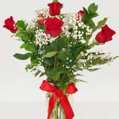6 red roses in a vase