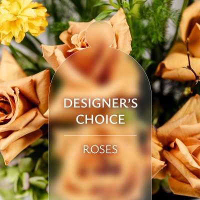 Designer’s choice rose arrangement with peach and yellow roses