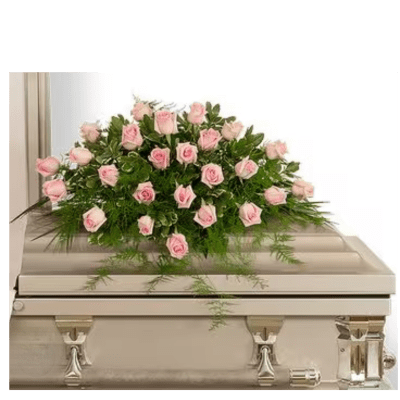Pink roses arranged on a white casket