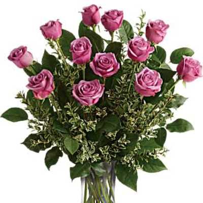 Arrangement of pink roses in a clear glass vase
