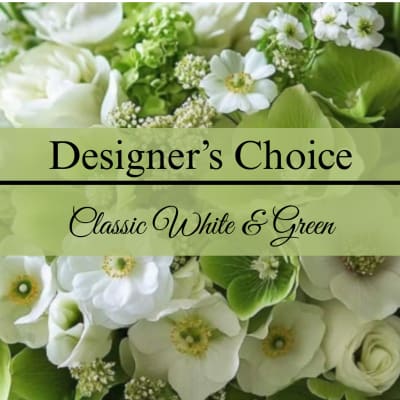 White and green floral arrangement with mixed blooms