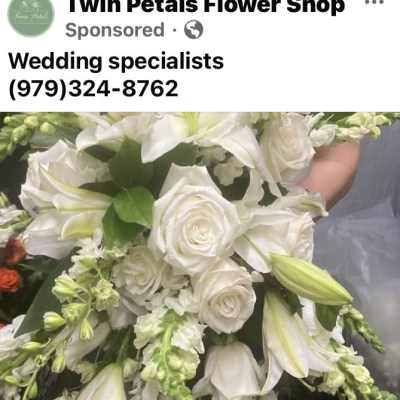 White bridal bouquet with roses and lilies