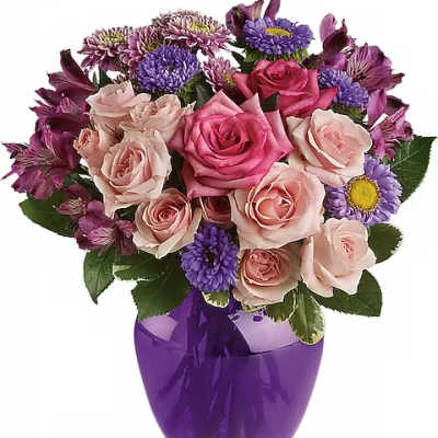 Bouquet of pink roses and purple daisies in a purple vase