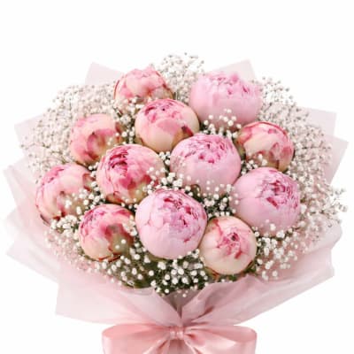 Pink peony bouquet with baby's breath and a satin ribbon