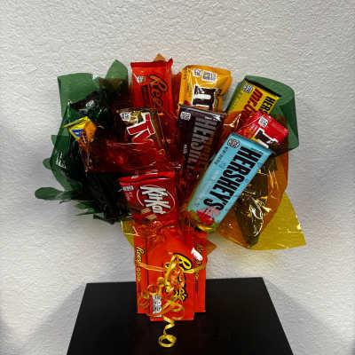 Bouquet of assorted candy bars wrapped in colorful cellophane