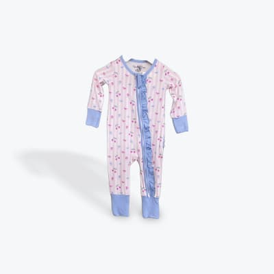 Pink and blue baby sleeper with cherry and bow print
