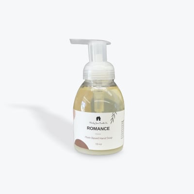 Bottle of plant-based hand soap labeled Romance