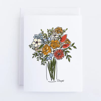 Greeting card with a colorful illustrated bouquet on the front