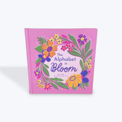 Pink book cover with colorful illustrated flowers around the title