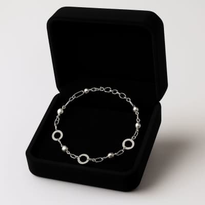 Silver bracelet in a black velvet jewelry box