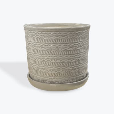 Textured beige ceramic planter with matching saucer
