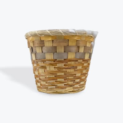 Woven wicker basket planter with a tapered shape