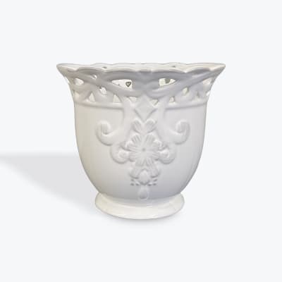 White ceramic flower vase with embossed floral details
