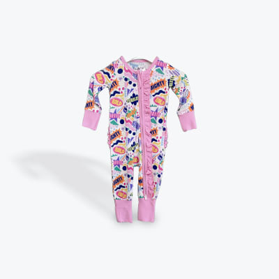 Colorful baby onesie with pink ruffles and bold graphic words