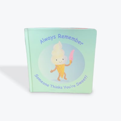 Mint-colored book with a smiling ice cream cone illustration and text