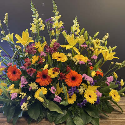 Large mixed bouquet with yellow lilies and orange gerbera daisies