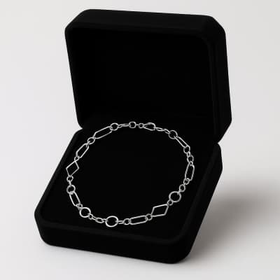 Silver chain bracelet in a black presentation box