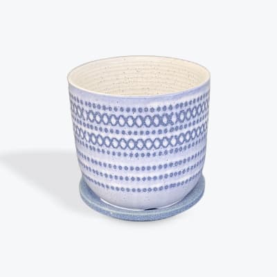 Blue and white ceramic planter with matching saucer