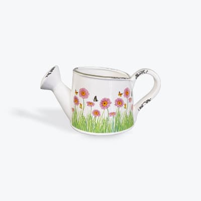 White ceramic watering can with pink flower and butterfly print