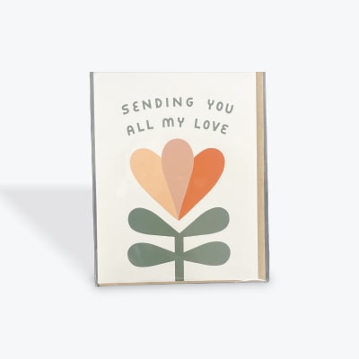 Greeting card with a stylized flower and the words "Sending You All My Love"