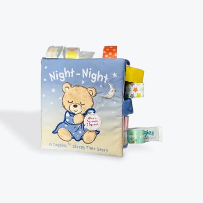 Soft baby cloth book with a sleeping bear and fabric tabs