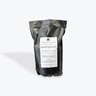 Black pouch of scented laundry booster with a white label