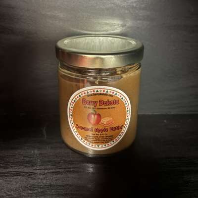 Jar of caramel apple butter with a metal lid