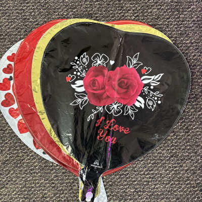 Heart-shaped balloon with red roses and "I Love You" text