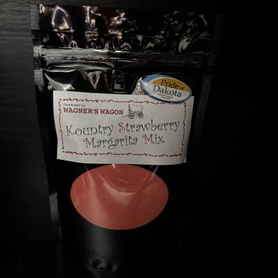 Black pouch of Kountry Strawberry Margarita Mix with a red circle label