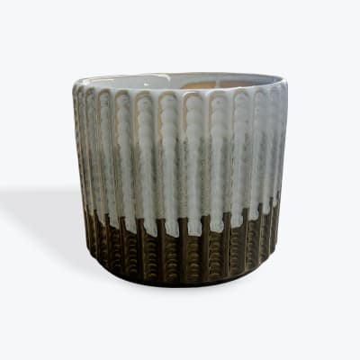Textured ceramic planter with a white and brown glazed finish