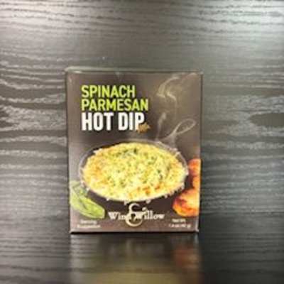 Box of spinach parmesan hot dip mix on a dark wood surface