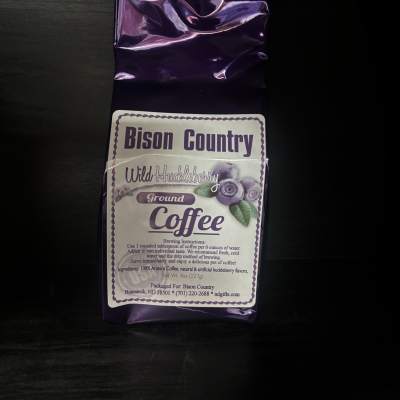 Purple bag of wild huckleberry ground coffee