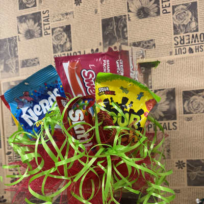 Candy bouquet with assorted snack bags and bright ribbon curls
