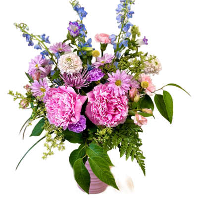 Pink and purple mixed bouquet in a pink vase